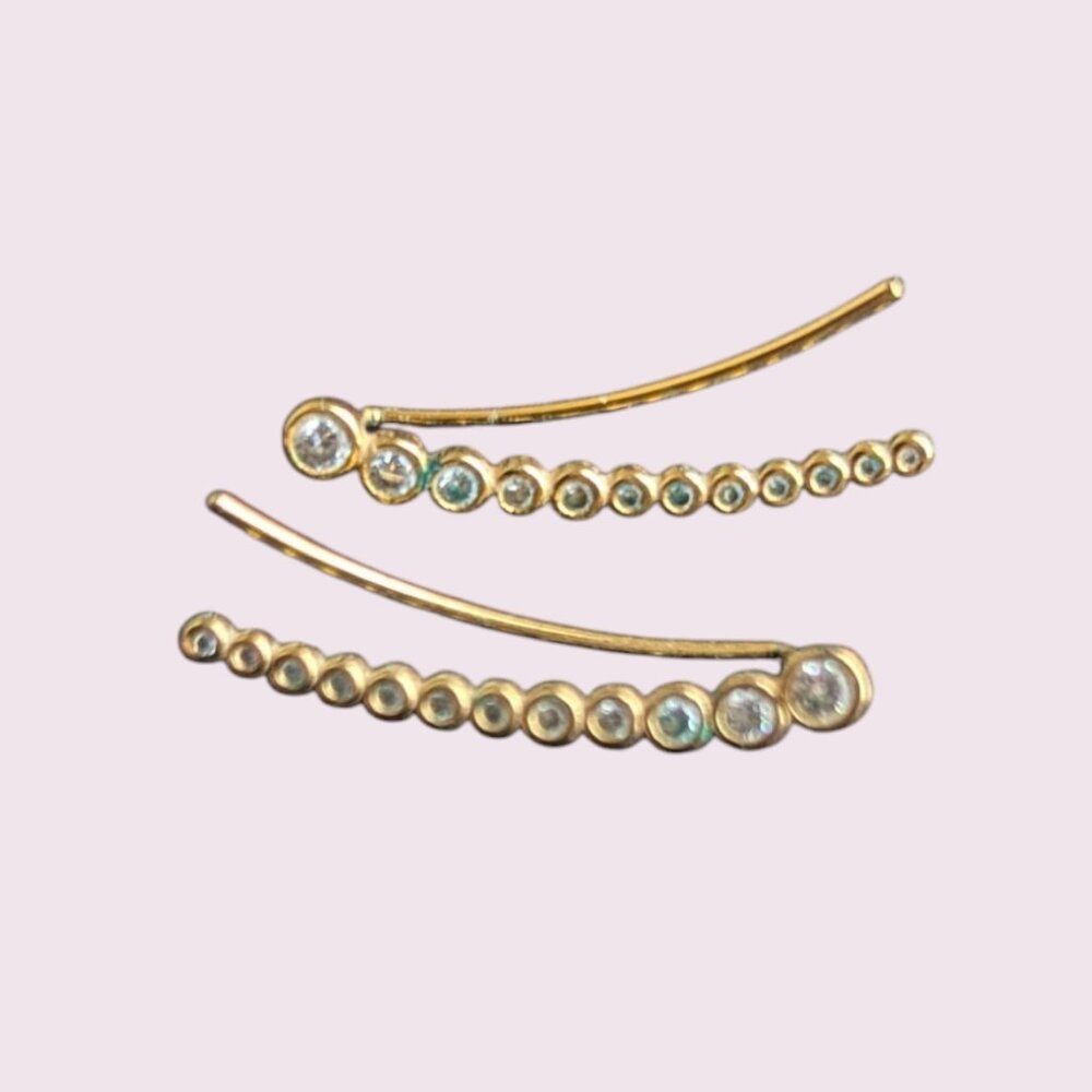 Gold ear crawlers with row of tapered cubic zirconia